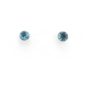 Two blue gemstones on a white background