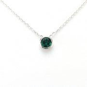 Front View Silver Created Emerald 2ct Round Necklace