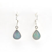 Teardrop-shaped opal earrings on a white background