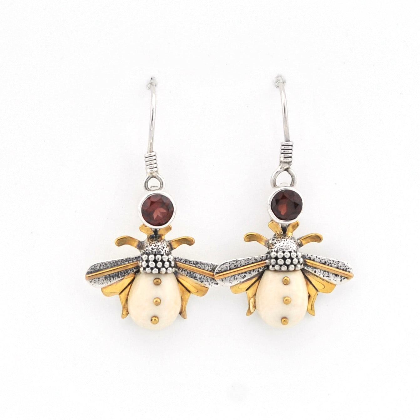 Bee-shaped earrings with gold and silver details on a white background