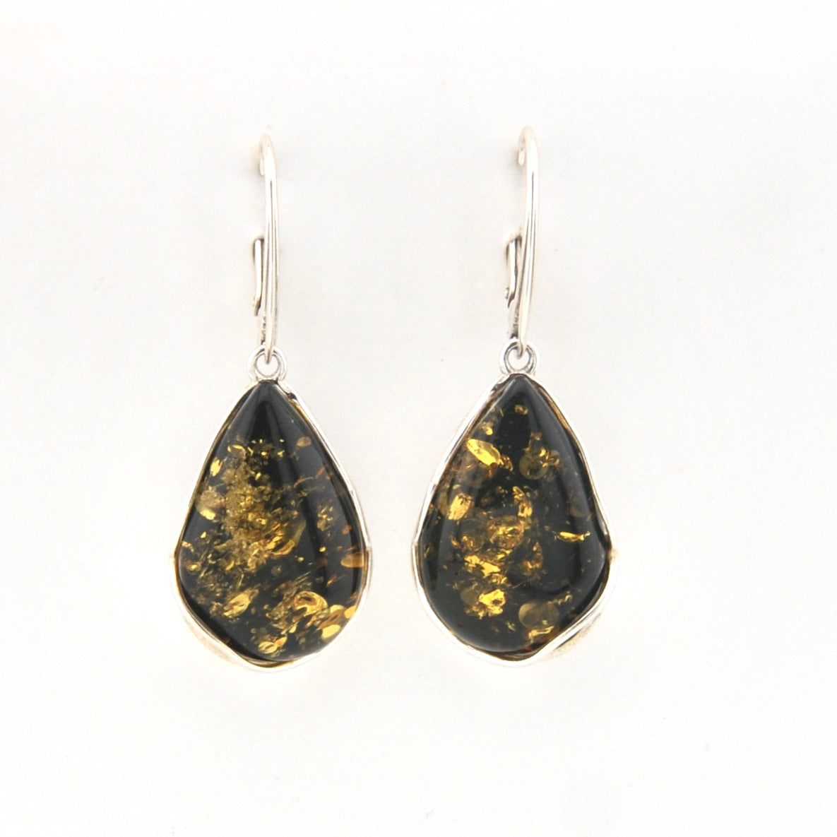 Teardrop-shaped amber earrings on a white background