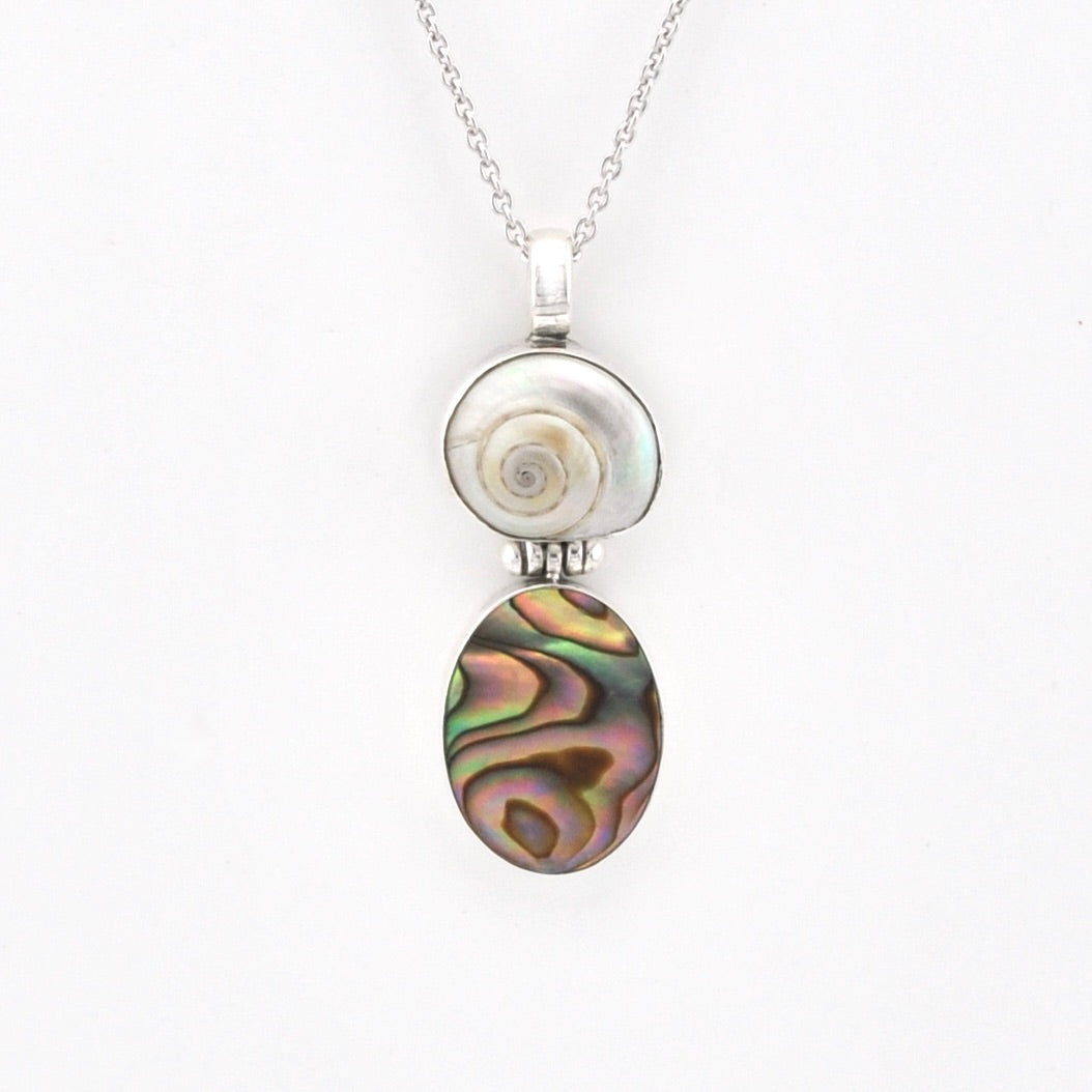 Silver necklace with a pendant on a white background