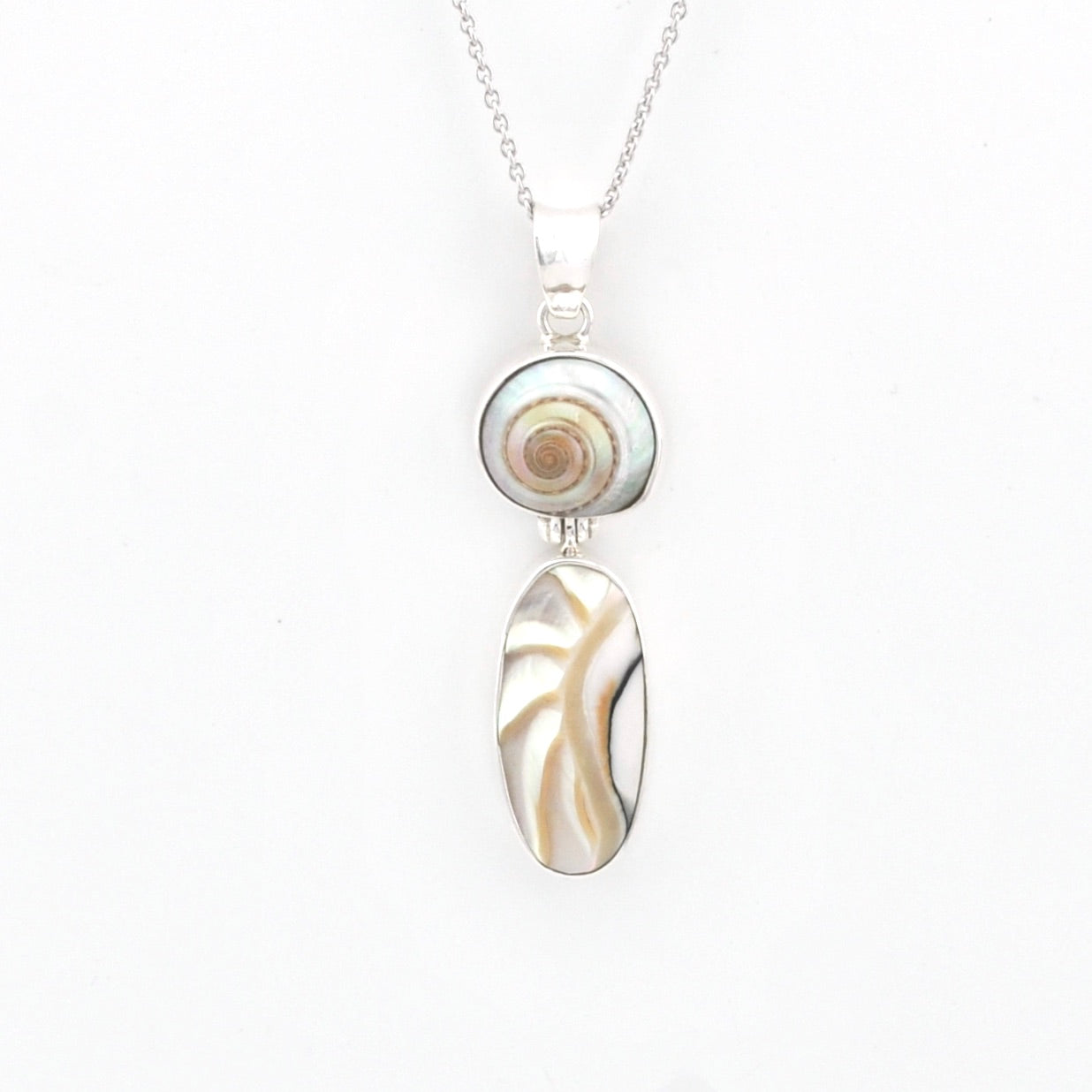 Necklace with a pendant featuring two oval stones on a white background