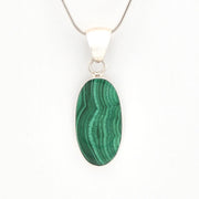 Green malachite pendant on a white background