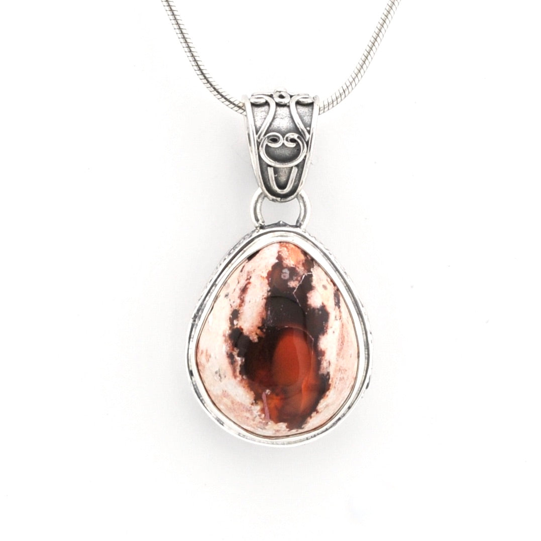 Copper pendant necklace on a white background
