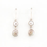 Pair of pearl earrings on a white background