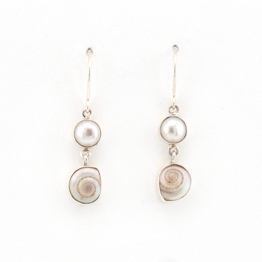 Pair of pearl earrings on a white background
