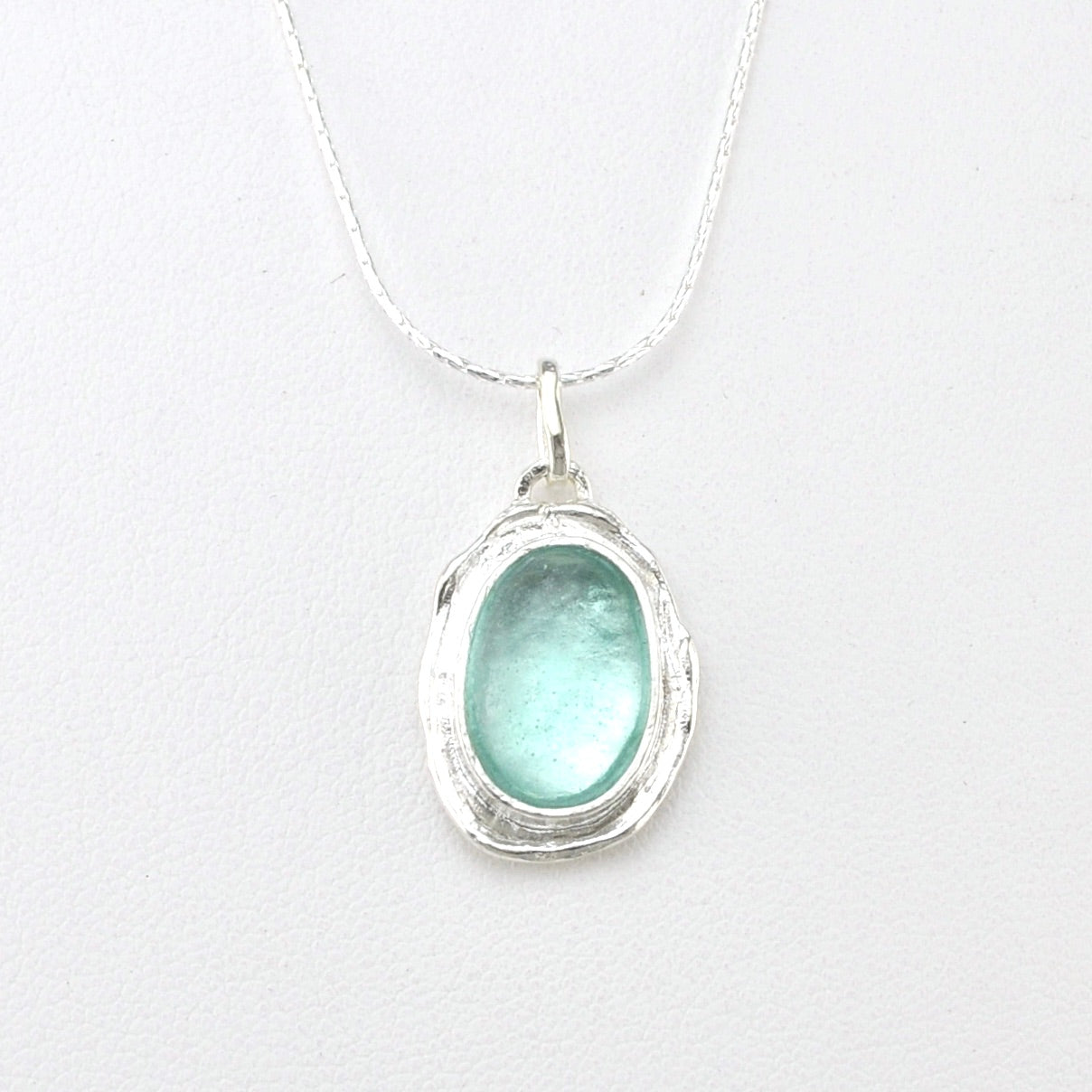 Front View Silver Roman Glass Oval Necklace