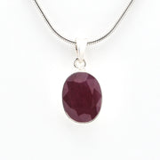 Necklace with a purple pendant on a white background