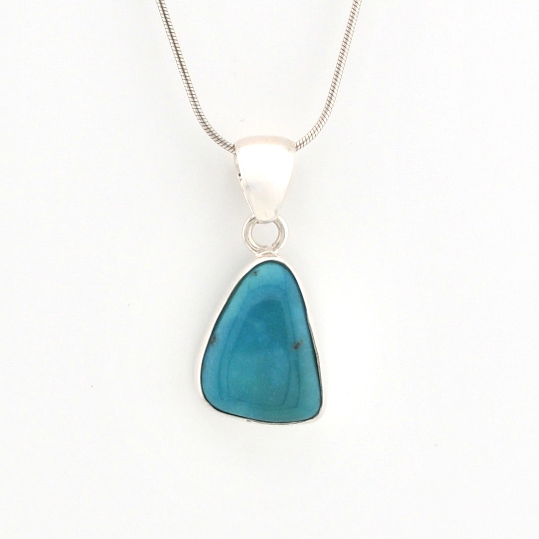 Necklace with a blue pendant on a white background