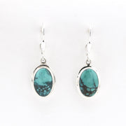 Silver Turquoise Oval Dangle Earrings on white background