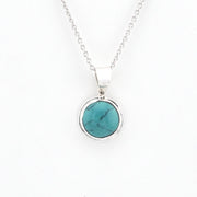 Turquoise necklace on a white background