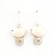 Shell-shaped earrings on a white background