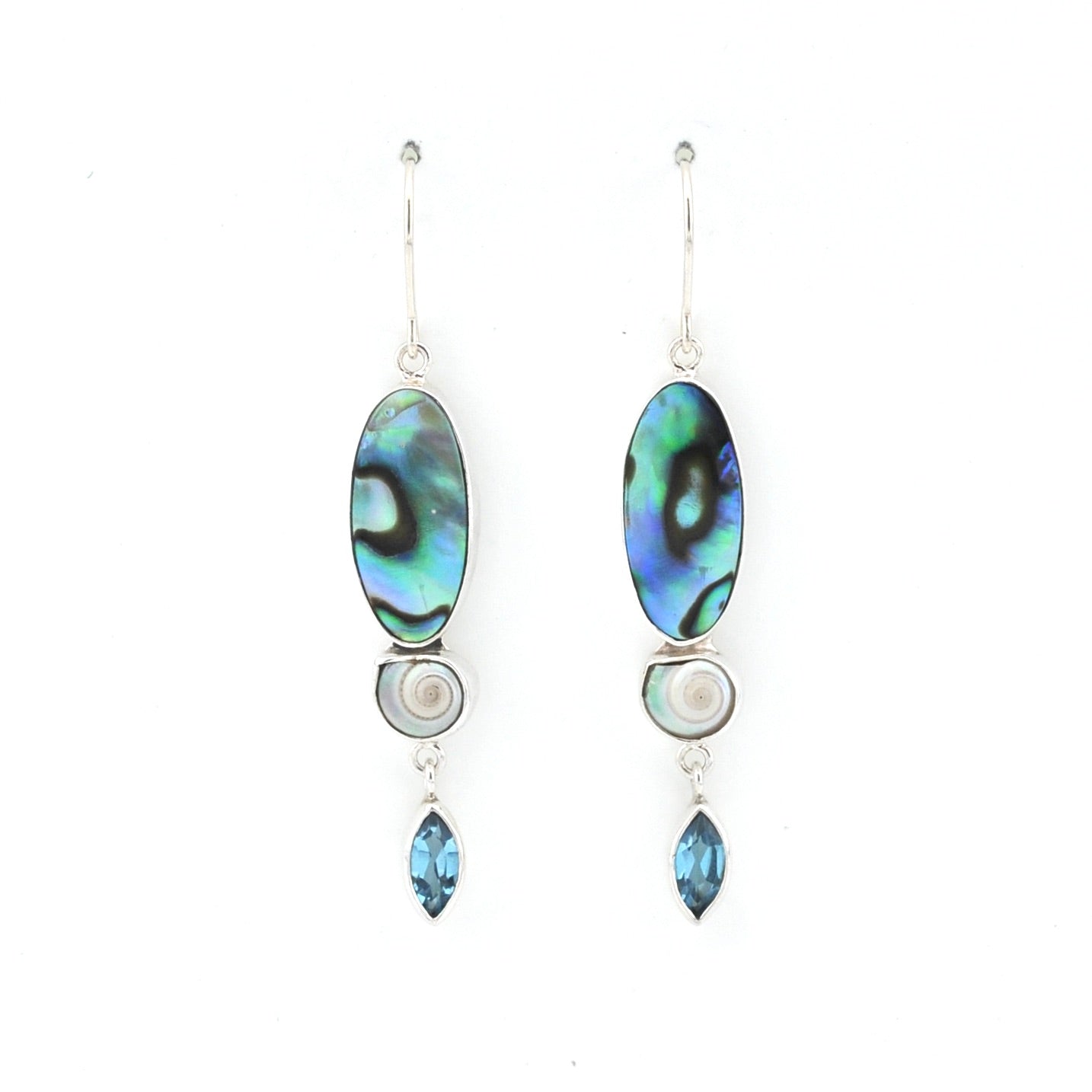 Pair of earrings with abalone shell, pearl, and blue gemstone on a white background