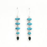 Handmade sterling silver dangle earrings featuring genuine turquoise and green quartz gemstones.