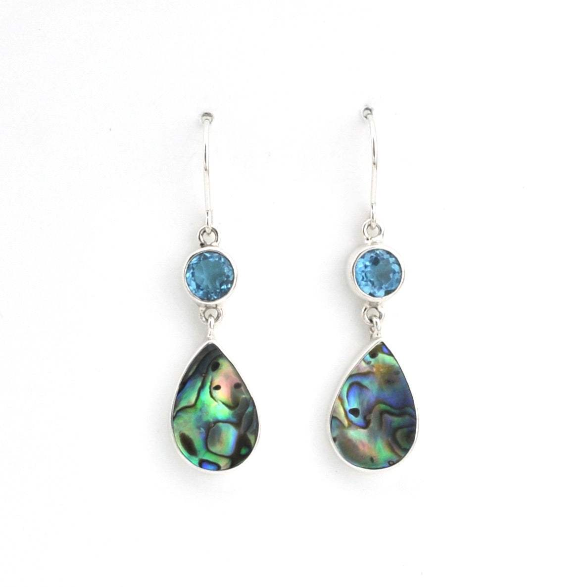Teardrop-shaped earrings with gemstones on a white background