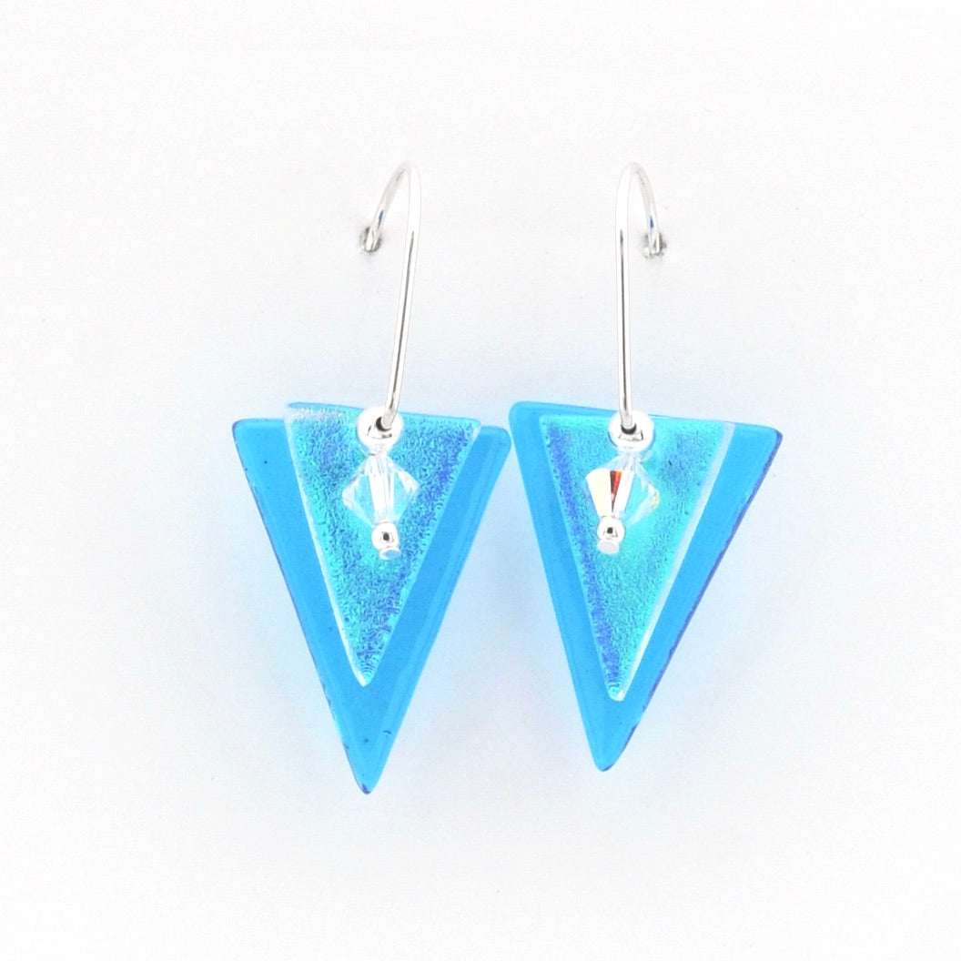 Pair of blue triangle earrings on a white background