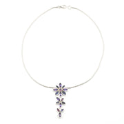 Handmade Sterling Silver Amethyst Iolite Rhodolite Flower Necklace on white background