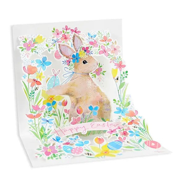 Easter card with a rabbit and floral design on a white background
