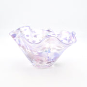 Iridescent glass bowl on a white background