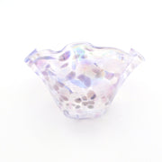 Iridescent glass bowl on a white background