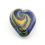 Heart-shaped glass paperweight with multicolored swirl pattern on a white background
