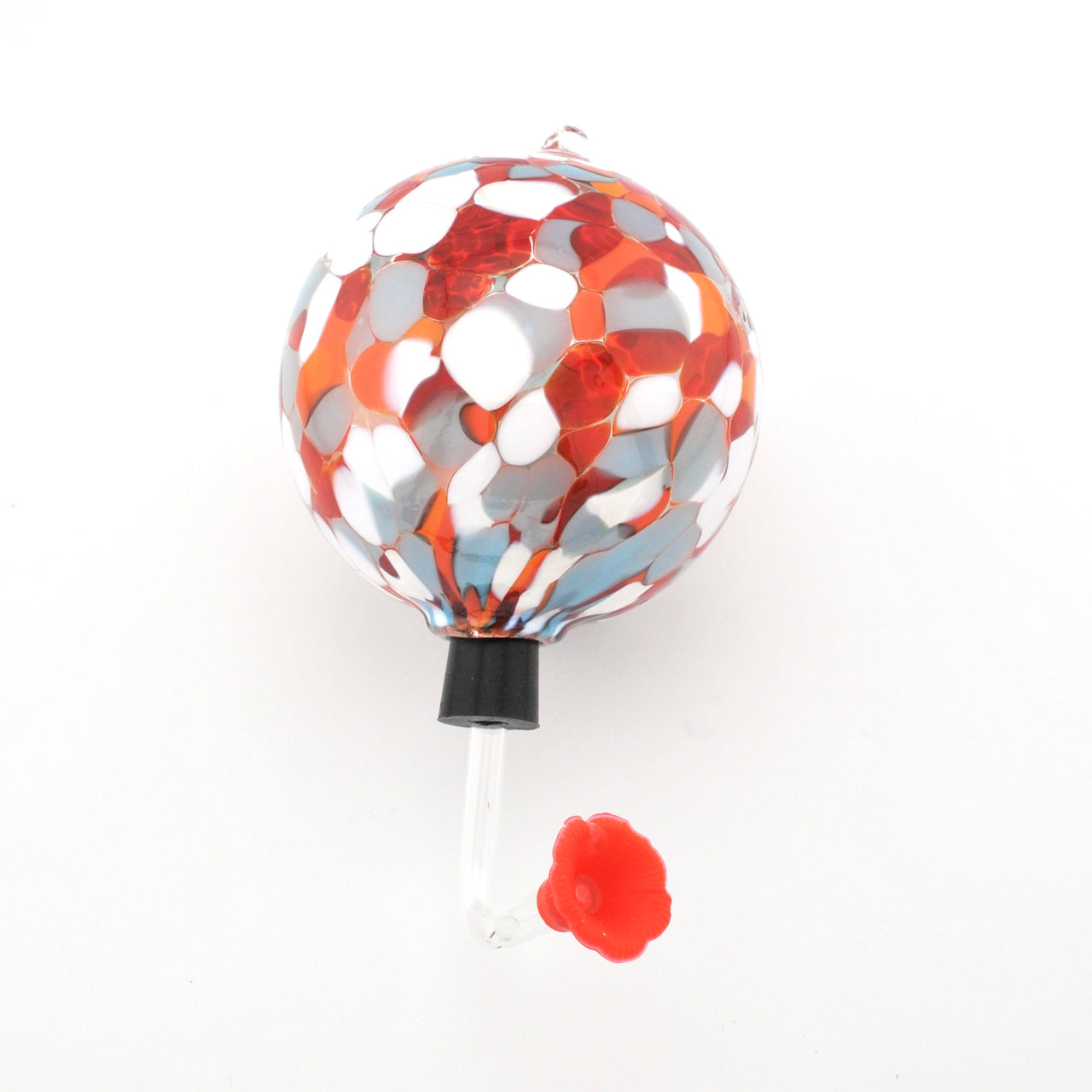 Decorative hummingbird feeder with red and silver design on a white background
