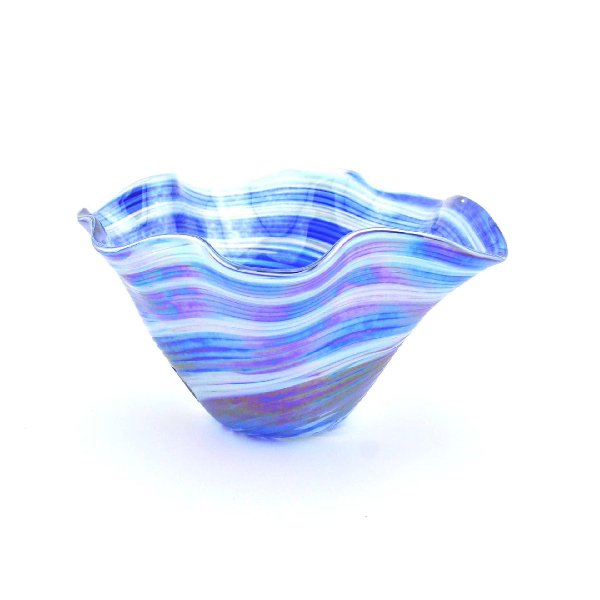 Blue and white wavy glass bowl on a white background
