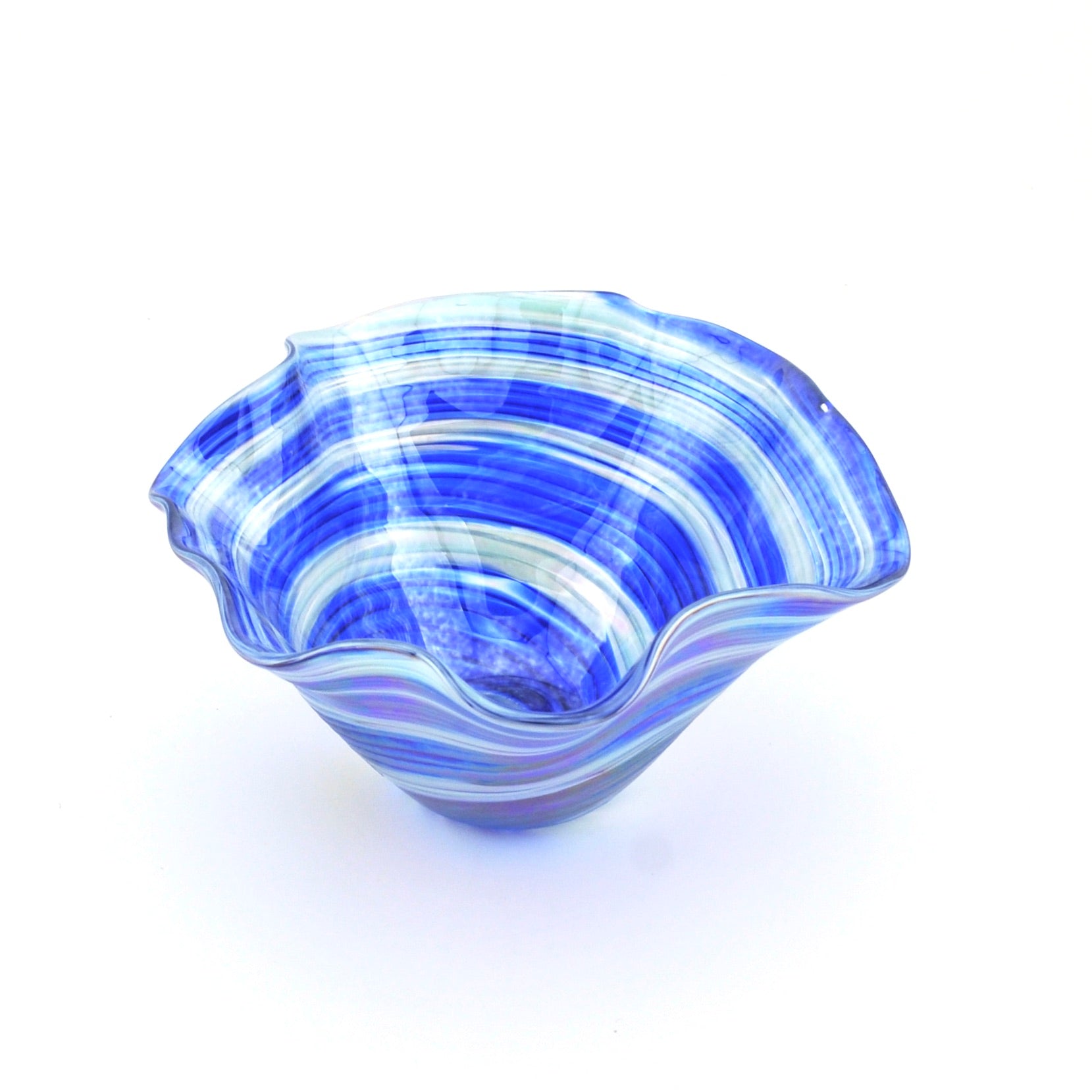 Blue and white striped glass bowl on a white background