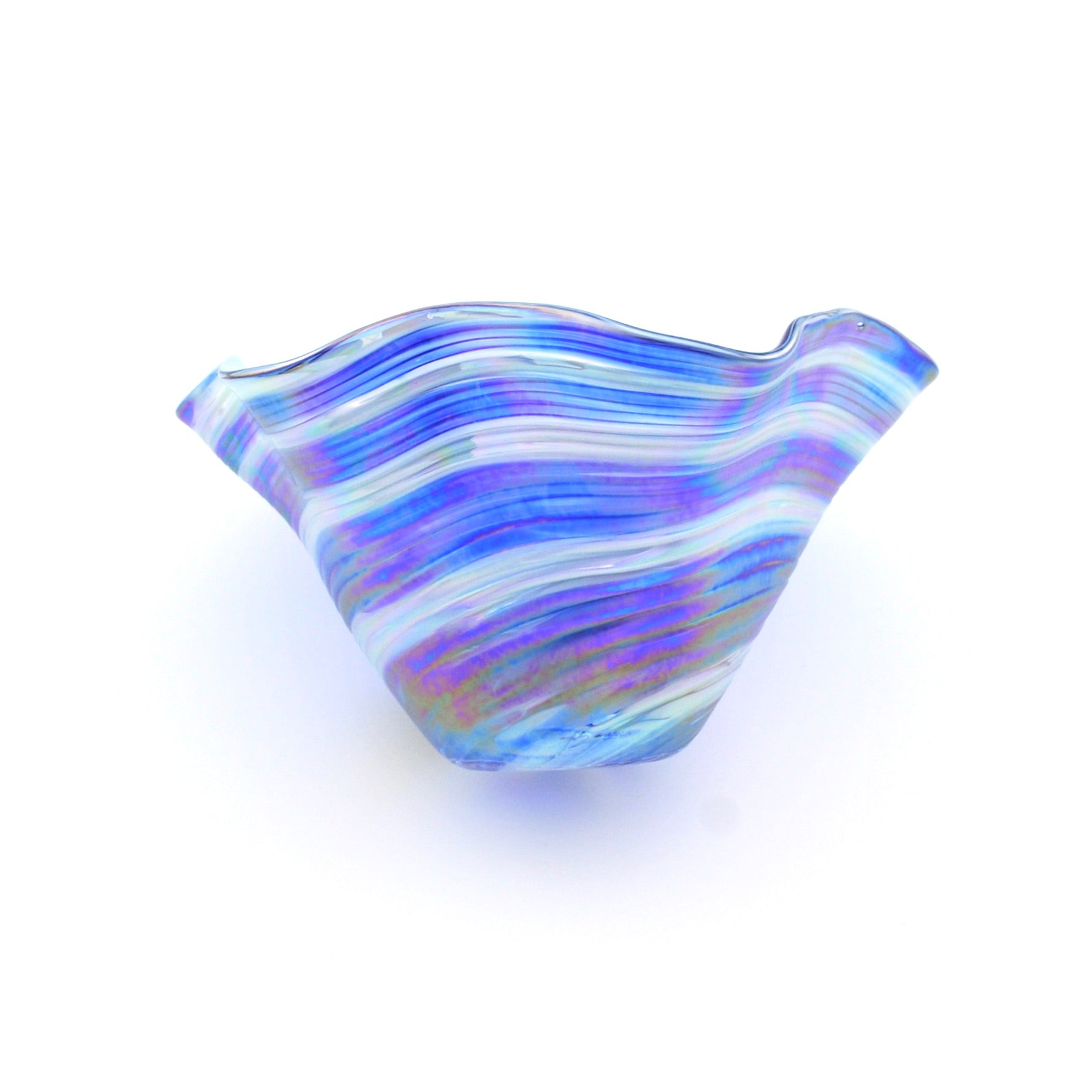 Glass sculpture with blue and white swirl pattern on a white background