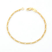 Gold chain bracelet on a white background