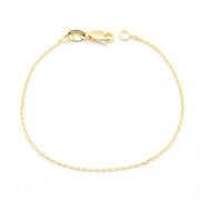 Gold bracelet on a white background