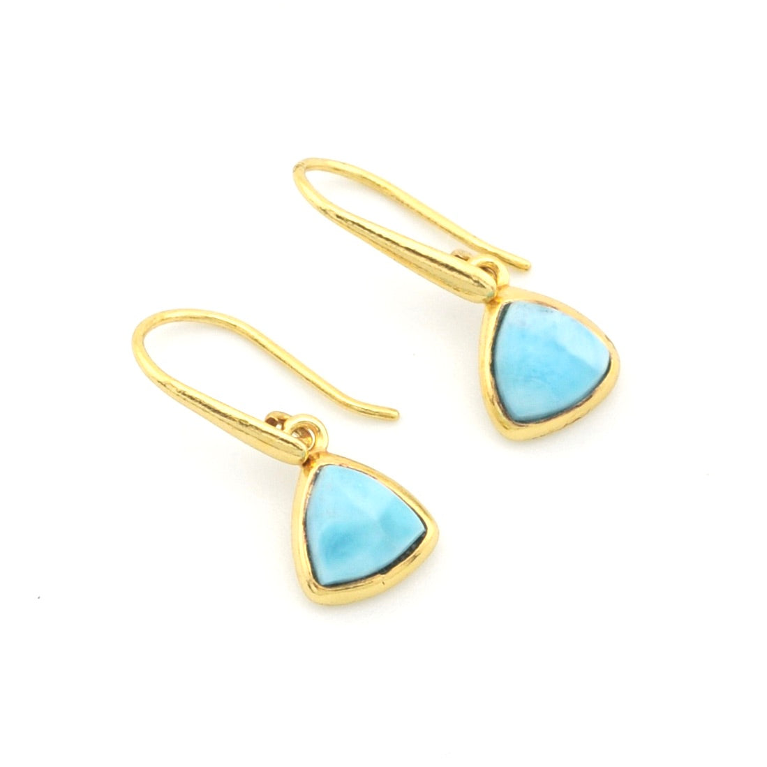 A pair of gold drop earrings with triangular light blue gemstone pendants, shown on a plain white background.