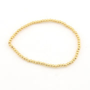 Gold bracelet on a white background