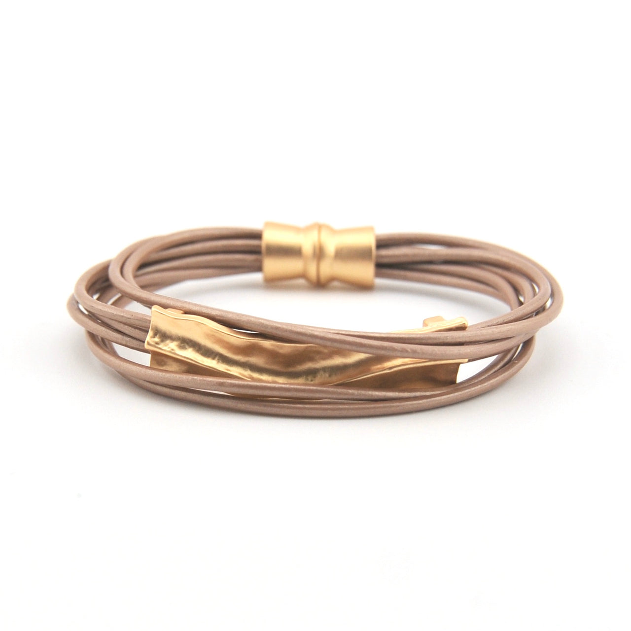 Bracelet with gold accents on a white background