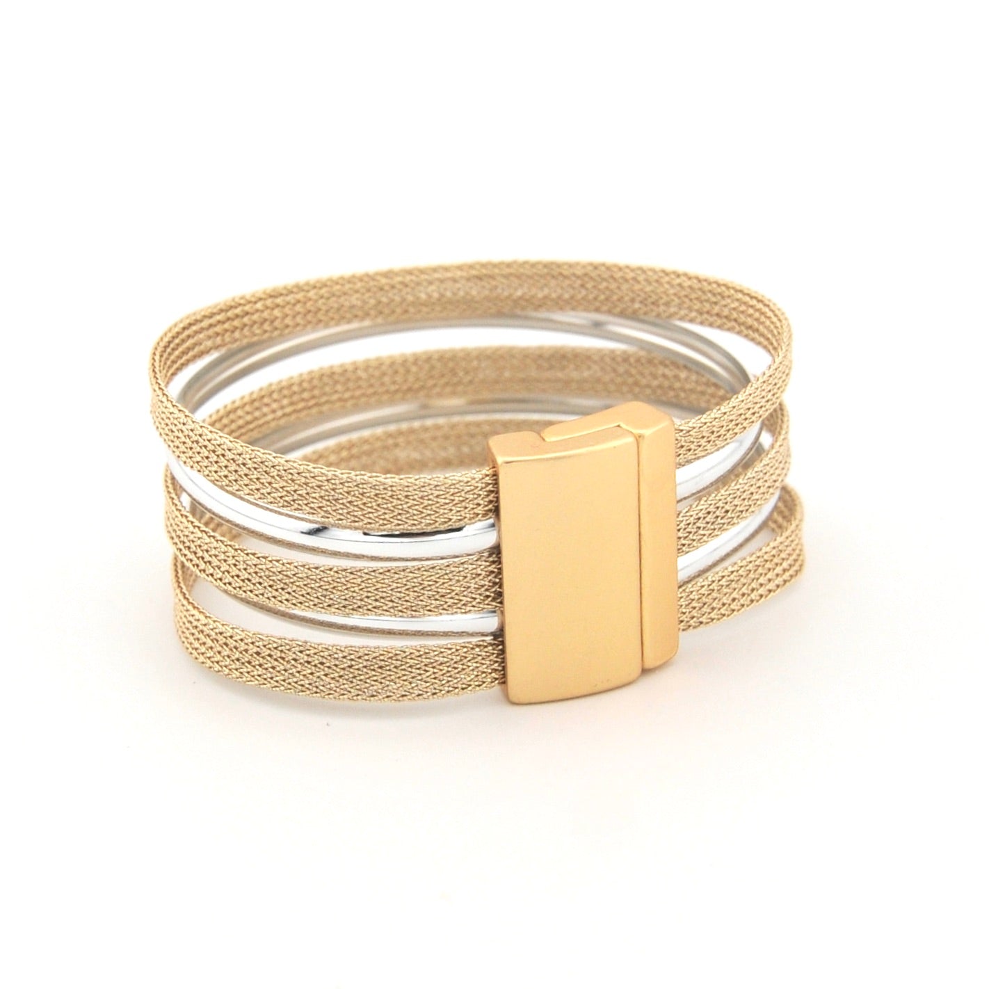 Multilayered bracelet with gold and silver bands on a white background