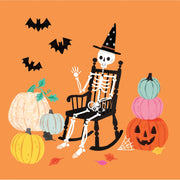 Halloween illustration featuring a skeleton wearing a witch hat sitting in a rocking chair, surrounded by pumpkins, bats, spiderwebs, and autumn leaves on an orange background.