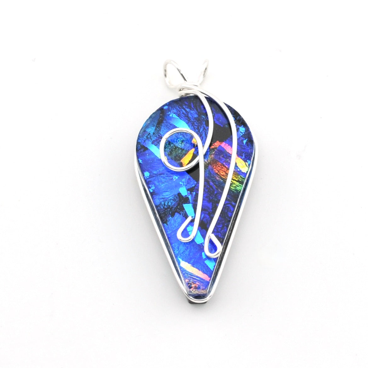 A teardrop-shaped pendant featuring a vibrant blue iridescent dichroic glass with silver wire art and a silver bezel, shown on a plain white background.