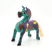 Colorful horse figurine with a white background