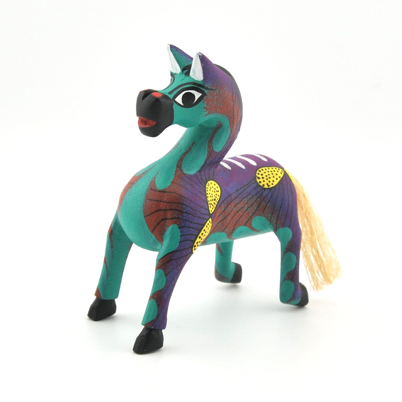 Colorful horse figurine with a white background