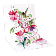 Greeting card with hummingbirds and pink flowers on a white background