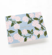 Floral patterned card with 'Thank You' text on a light blue background