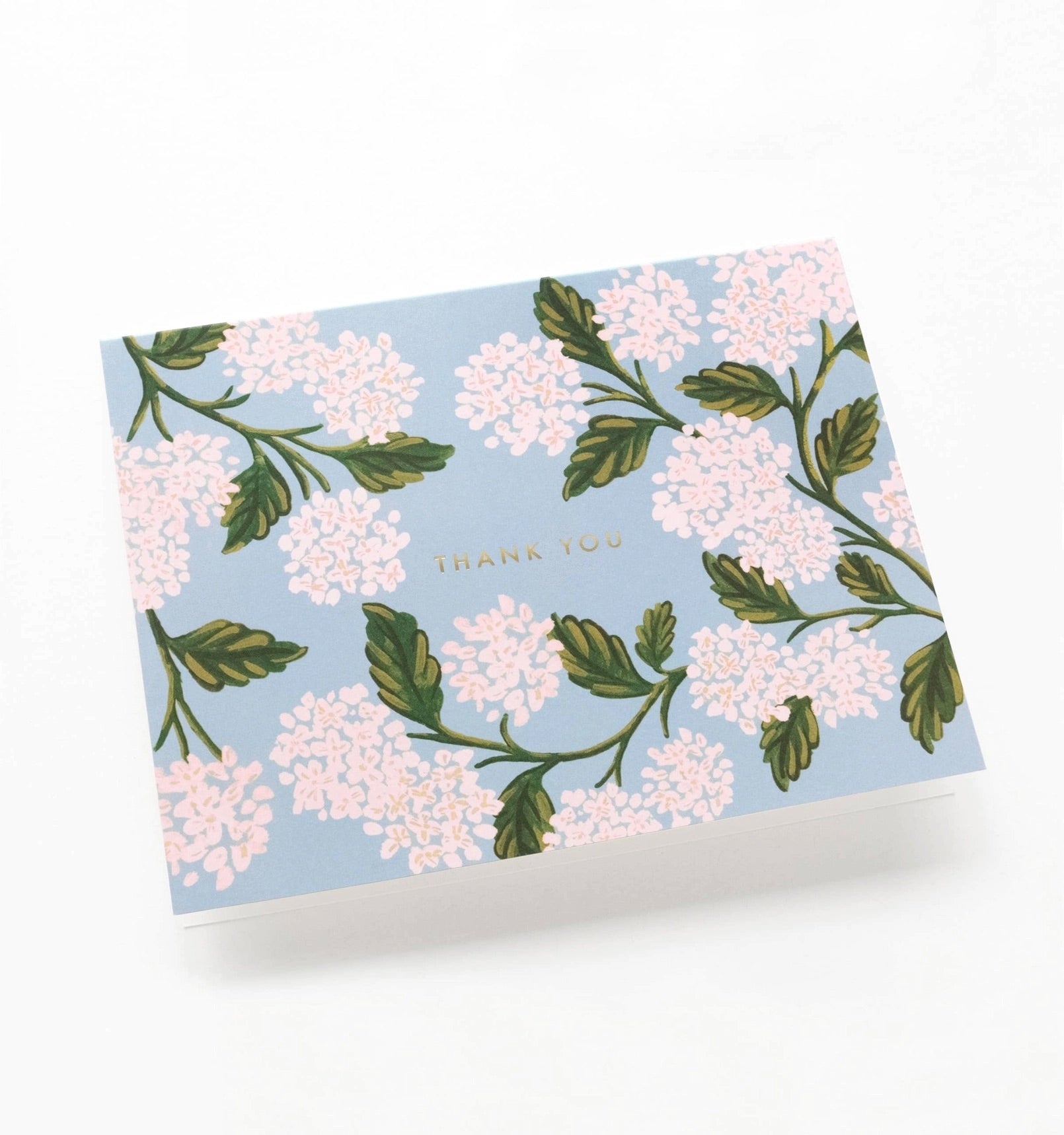 Floral patterned card with 'Thank You' text on a light blue background