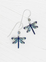 Dragonfly-shaped earrings on a white background