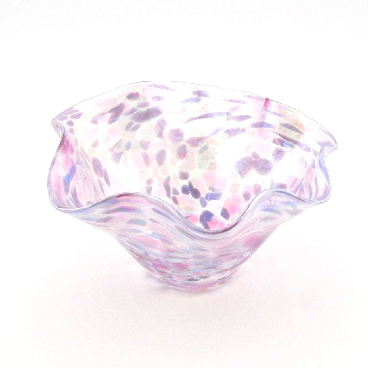 Multicolored glass bowl on a white background
