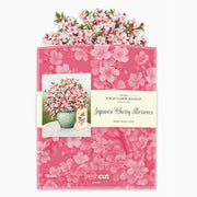 Product packaging with pink floral design and 'fresh cut paper' branding