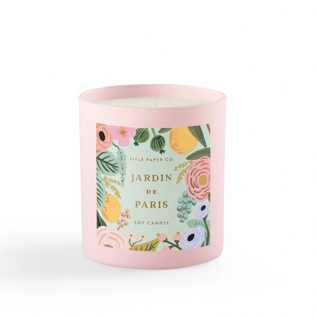 Candle in pink glass container