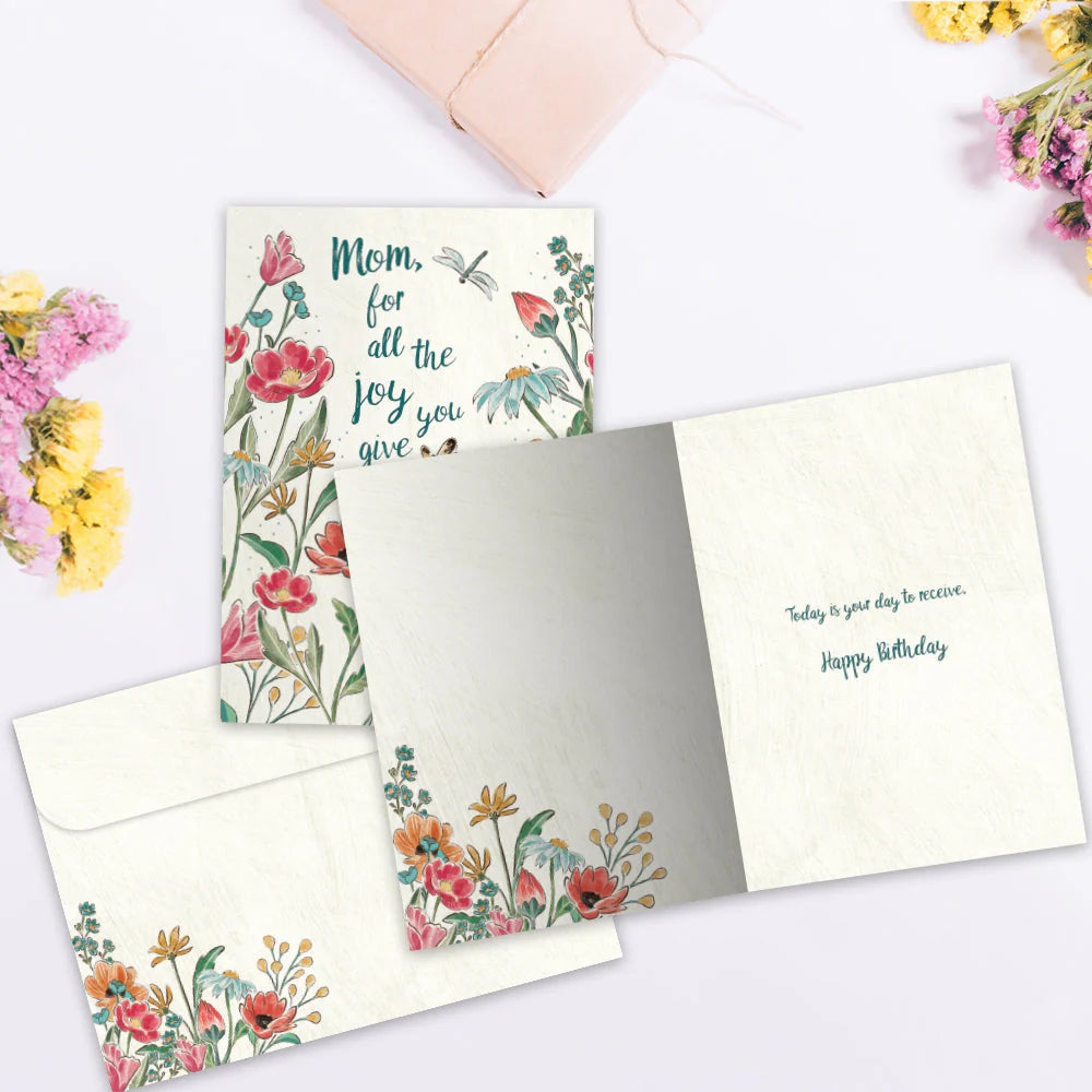 Greeting card with floral design and text on a white background