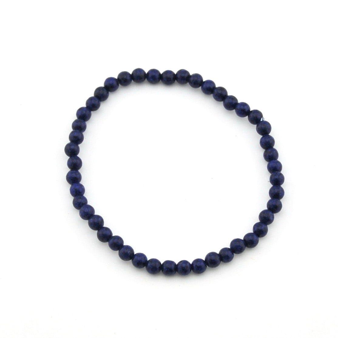 Navy blue beaded bracelet on a white background