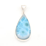 Teardrop-shaped larimar pendant on a white background
